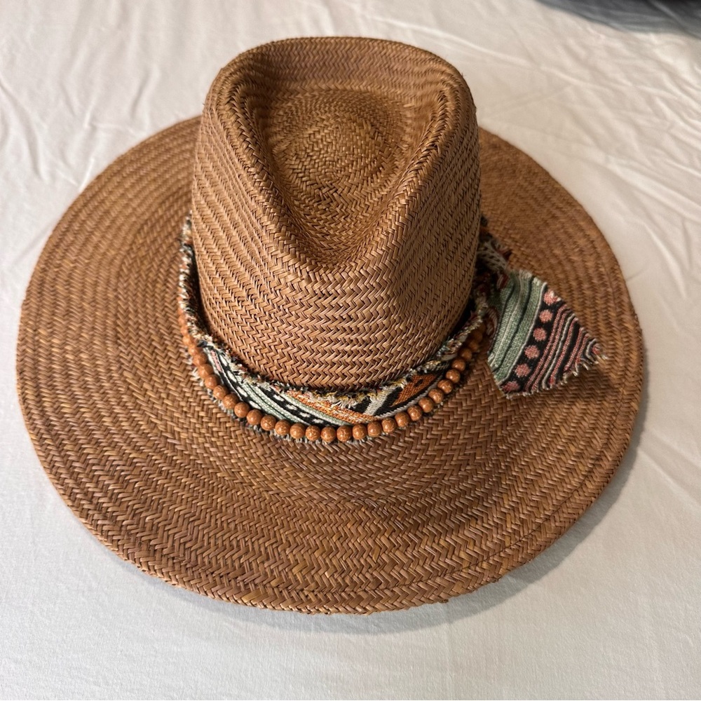Stylish Brown Woven Hat with Patterned Band